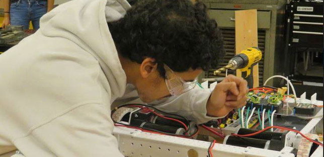 Student working on wiring